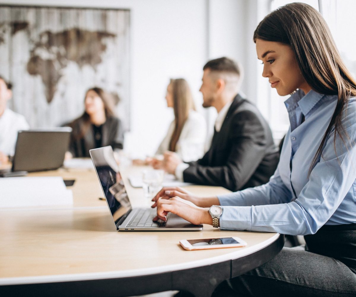 Group of people working out business plan in an office